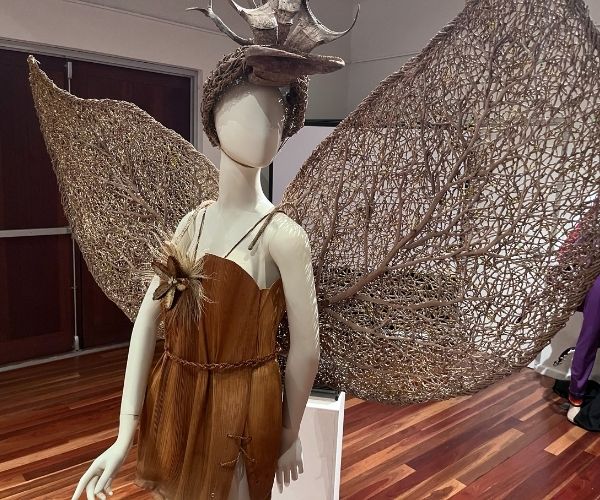 a wearable art piece on a manequin